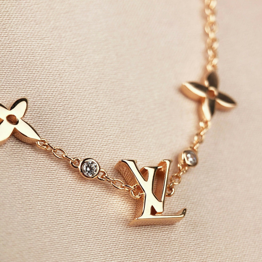 [Saipan]STAR AND SUN 7 MOTIFS GOLD BRACELET