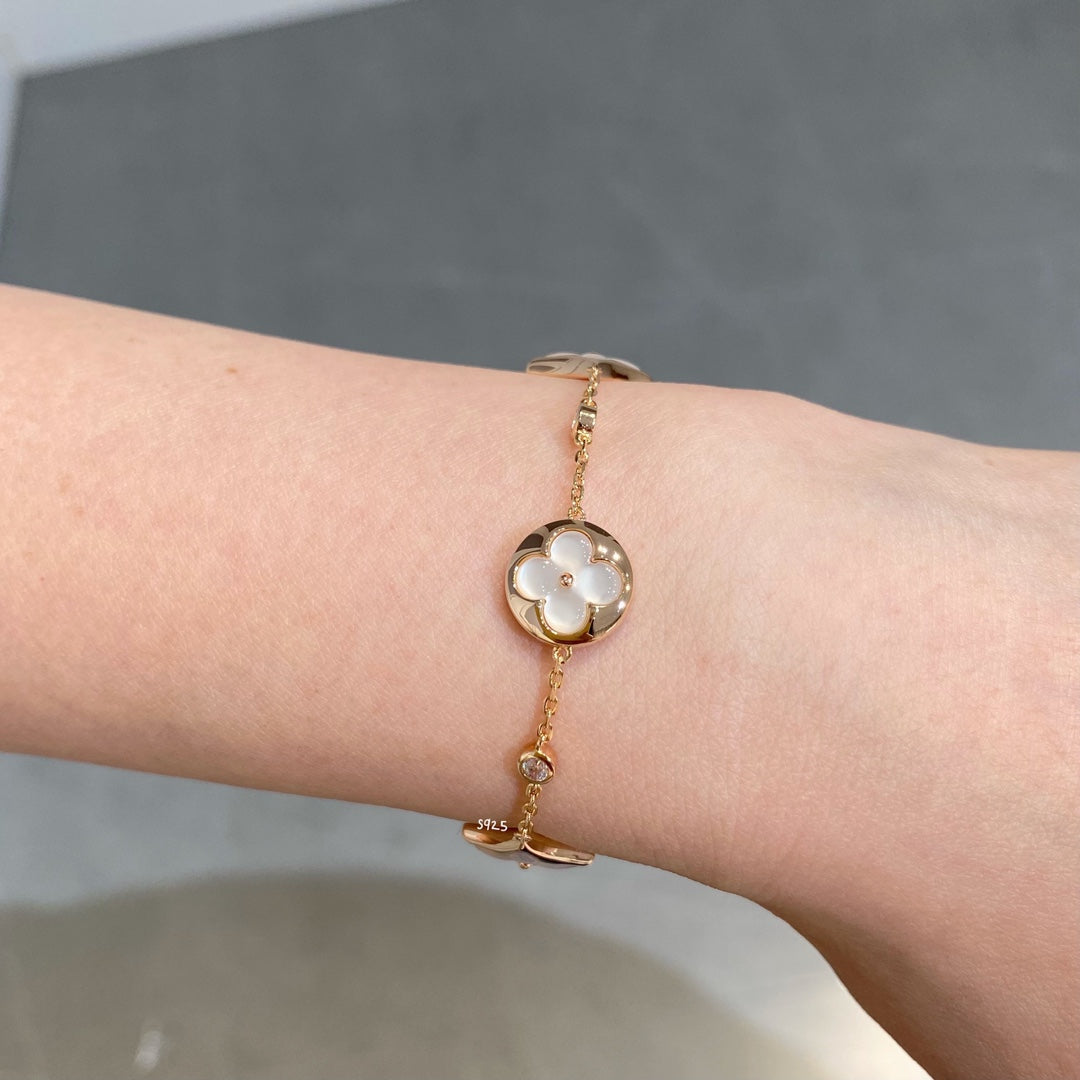 [Saipan]STAR AND SUN 4 MOTIF WHITE MOP ROSE GOLD BRACELET